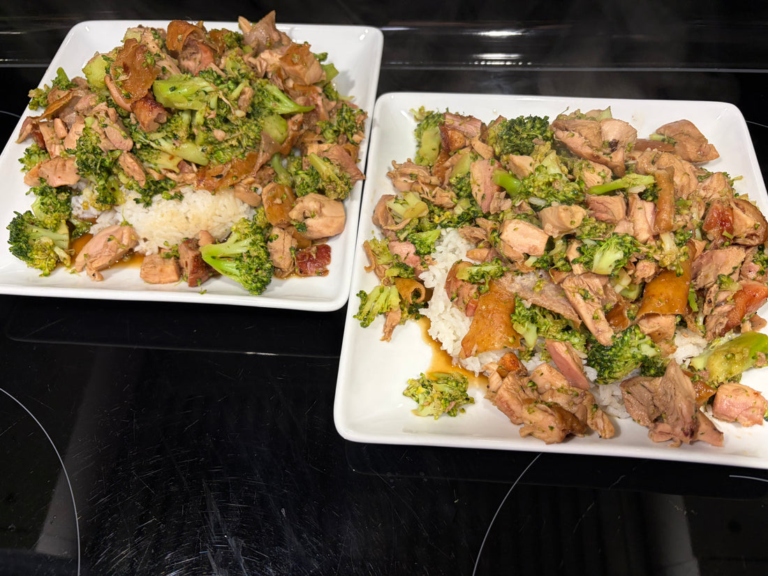 Two white square plates of honey-garlic chicken and broccoli stir-fry served over white rice